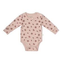Load image into Gallery viewer, Pink baby bodysuit with floral pattern on a white background