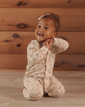 Load image into Gallery viewer, Organic Long John Pajamas in Holly Fleur on a baby, side view
