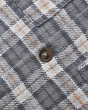 Load image into Gallery viewer, Relaxed Woven Jumpsuit in Winter Plaid, close-up of the plaid and button