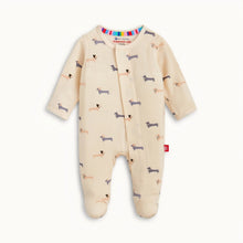 Load image into Gallery viewer, Magnetic Me Beenie Von Weinie cream baby footie with dachshund print, long sleeves, and enclosed feet.
