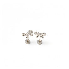 Load image into Gallery viewer, Pair of silver-tone bow stud earrings with open loops and round flat backs on a white background.