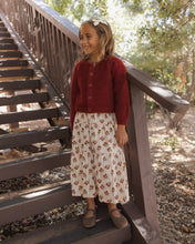 Load image into Gallery viewer, Fuzzy Cardigan in Ruby on a girl on outdoor stairs