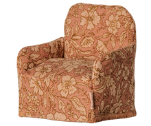 Load image into Gallery viewer, Front left view of the Maileg Flower folding chair, showing its floral fabric, rounded backrest, armrests, and small side label.