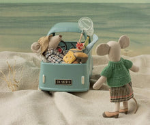 Load image into Gallery viewer, Rear view of Grandma Mouse beside a mint toy car packed with another mouse, picnic food, and a fishing net.