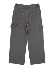 Load image into Gallery viewer, A pair of dark gray cargo pants shown from the back, featuring two large back patch pockets and side cargo pockets, photographed against a plain white background.
