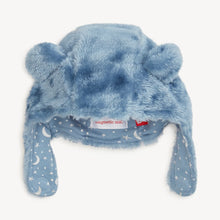 Load image into Gallery viewer, Magnetic Me Winter Sky blue minky bear hat with rounded ears and open chin straps showing moon-and-star print lining.