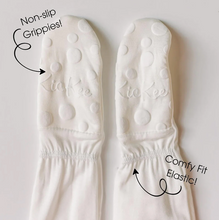 Load image into Gallery viewer, White footies with text highlighting non-slip grippies and comfy fit elastic on a light gray background