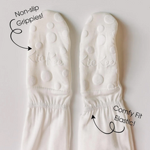 Load image into Gallery viewer, White footies with text highlighting non-slip grippies and comfy fit elastic on a light gray background