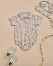 Load image into Gallery viewer, Baby outfit set with checkered romper, hat, shoes, and teething ring on a beige background