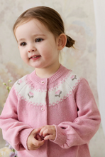 Load image into Gallery viewer, Child wearing a pink knitted cardigan with floral patterns against a neutral background