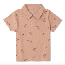 Load image into Gallery viewer, Pink polo shirt with palm tree patterns on a white background