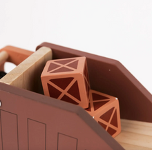 Load image into Gallery viewer, Wooden toy truck with orange cargo cubes on a white background