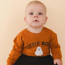 Load image into Gallery viewer, A baby wearing an orange long-sleeve sweatshirt with 'LITTLE BOO' and a ghost graphic, paired with black pants, set against a solid beige background.