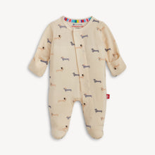 Load image into Gallery viewer, Beenie Von Weinie dachshund-print baby footie with fold-over mitten cuffs closed and enclosed feet.