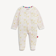 Load image into Gallery viewer, A baby footed sleeper by Baby Bonnet, featuring a white base with a gold star and moon pattern and a small pink crescent moon. The sleeper has long sleeves, a snap-button front, and a colorful striped inner collar.
