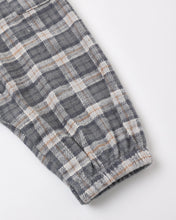 Load image into Gallery viewer, Relaxed Woven Jumpsuit in Winter Plaid, detail of the cuffed ankle
