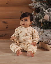 Load image into Gallery viewer, Raglan Jumpsuit in Gingerbread on a seated baby, front view
