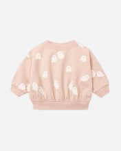 Load image into Gallery viewer, A light pink long-sleeve sweatshirt for toddlers, featuring an all-over print of small white ghost illustrations, displayed against a clean off-white background.
