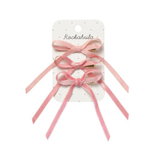 Load image into Gallery viewer, Set of pink hair bows on a Rockahula branded card against a white background
