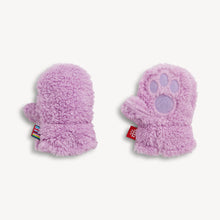 Load image into Gallery viewer, A pair of fuzzy lavender mittens shown from the back, featuring a plush faux-fur texture, a paw print design on one mitten, and a small red brand tag.
