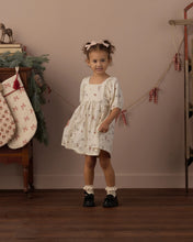 Load image into Gallery viewer, Brea Dress in Holiday Mouse, cream on a girl by holiday stockings
