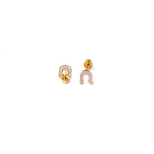 Load image into Gallery viewer, Gold-tone horseshoe stud earrings with pale pink detailing arranged at different angles, showing the horseshoe fronts and flat-back closures.
