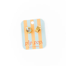 Load image into Gallery viewer, Gold-tone triple-band hoop earrings showing the rounded shape, hinged closures, and curved posts on a white background.
