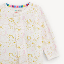 Load image into Gallery viewer, A baby long-sleeve sleep sack with a white background, decorated with a gold and pink celestial pattern of stars, moons, and clouds. The brand 'Le Co-Préfident magnétisme' is visible on the inner neck label.
