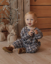 Load image into Gallery viewer, Relaxed Woven Jumpsuit in Winter Plaid on a seated baby by holiday decor

