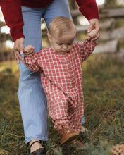 Load image into Gallery viewer, Relaxed Woven Jumpsuit in Vintage Plaid on a toddler walking holding a hand
