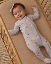Load image into Gallery viewer, Smiling baby in a wooden crib wearing a gray snowman-print footie with enclosed feet and a bow headband.
