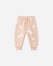 Load image into Gallery viewer, A pair of baby jogger pants in a soft, pale pink color, decorated with a playful pattern of small white cartoon ghosts. The pants feature an elastic waistband with a matching drawstring and ribbed ankle cuffs, shown flat on a light gray background.

