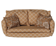 Load image into Gallery viewer, Front view of Maileg large ocher mouse sofa bed with patterned upholstery and two floral throw pillows.
