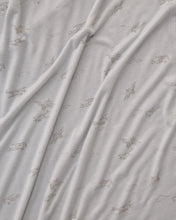 Load image into Gallery viewer, Close-up of gray fabric with subtle pattern
