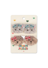 Load image into Gallery viewer, A pair of cat-shaped acrylic clips in a 2-pack, displayed on their original cream-colored backing card. The top pair is a gray cat with blue bows, and the bottom pair is a beige/tan cat with pink bows.
