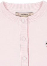 Load image into Gallery viewer, Close-up of a light pink knit cardigan sweater featuring a ribbed crew neck, white buttons, and a visible Kongjes Slajd brand label at the collar.
