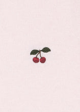 Load image into Gallery viewer, A small embroidered cherry motif with two red cherries and dark green leaves on a thin brown stem, centered on a light pink textured fabric background.
