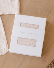 Load image into Gallery viewer, White packaging box with floral pattern on a wooden surface, featuring 'Jellybaby' and 'Quincy Mae' branding.

