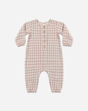 Load image into Gallery viewer, Cream woven baby jumpsuit with red and gray-green plaid, front buttons, long sleeves, and elastic wrist and ankle cuffs.
