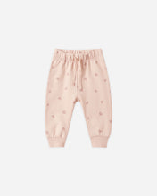Load image into Gallery viewer, Light pink children's jogger pants with a small heart pattern, elastic waistband, and drawstring, shown flat on a light gray background.
