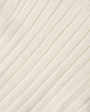 Load image into Gallery viewer, A close-up of a cream-colored ribbed knit fabric, showing the diagonal ribbed texture and fine yarn details.
