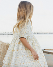 Load image into Gallery viewer, Person wearing a dress with a blurred background
