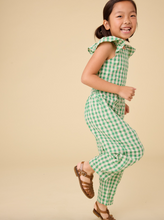 Load image into Gallery viewer, Child wearing a green checkered outfit on a beige background
