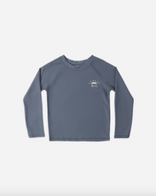 Load image into Gallery viewer, Blue long-sleeve shirt with a logo on a white background

