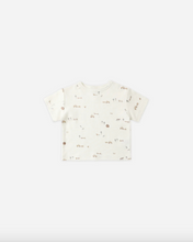 Load image into Gallery viewer, White t-shirt with small patterns on a white background
