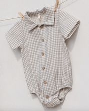 Load image into Gallery viewer, Checkered baby romper with buttons on a white background
