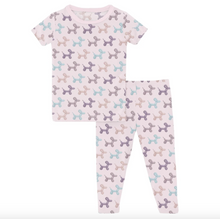 Load image into Gallery viewer, Children's pajama set with dog pattern on a white background
