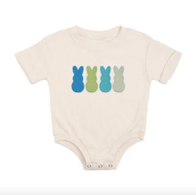 Load image into Gallery viewer, Beige baby onesie with blue and green bunny designs on a white background
