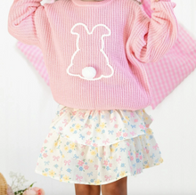 Load image into Gallery viewer, Child wearing a pink sweater with a bunny design and a floral skirt on a white background
