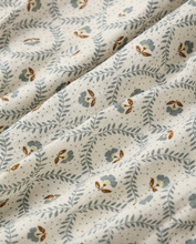 Load image into Gallery viewer, Fabric with a subtle floral pattern on a neutral background
